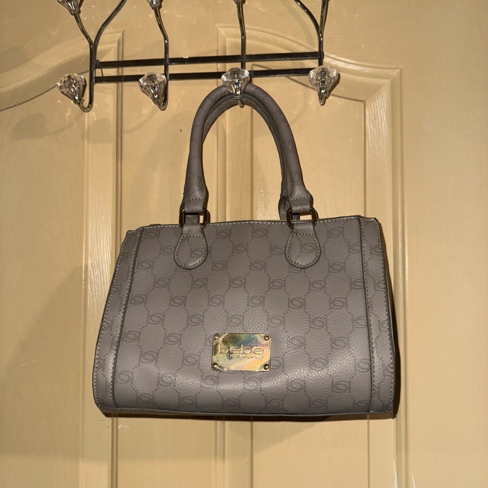 NEW UNUSED Bebe Handheld purse